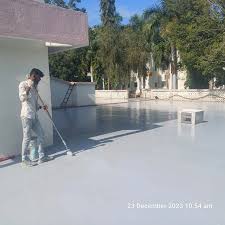 Protective coating being applied to an outdoor floor